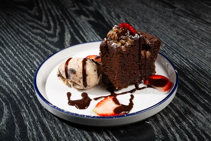 House chocolate walnut cake with ice cream