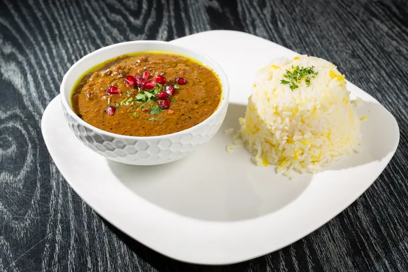 Fessen-Joon pomegranate and walnut stew with tempeh and saffron rice