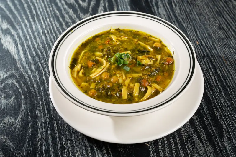 Osh soup with beans, lentils and spinach noodles