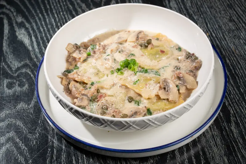 Ravioli in a creamy mushroom sauce